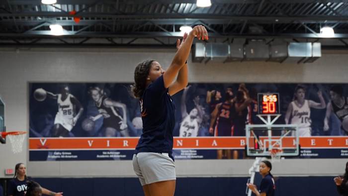 Kymora Johnson takes a three-pointer during Virginia women's basketball practice at the UVA practice facility at John Paul Jones Arena.